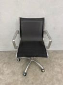 A contemporary Eames style mesh and brushed aluminium office or desk swivel chair with height