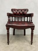 A late 20th early 21st century mahogany framed Chesterfield captain's tub office or desk armchair