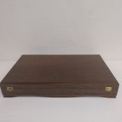 A new and unused silver plated cutlery canteen set for twelve place settings in a fitted case by