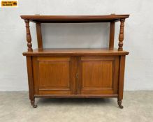A late 19th century walnut two-tier buffet sideboard cabinet on castors. H.108 W.107 D.41cm.