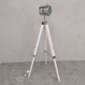 A contemporary chrome spotlight style lamp on adjustable tripod base. H.126cm.