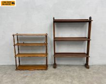 A 19th century wall mounted open bookcase with four shaped tiers on turned and carved supports