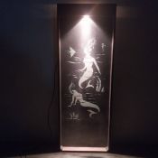 A 1980s vintage display cabinet or vitrine; internally lit and decorated with stylised figural