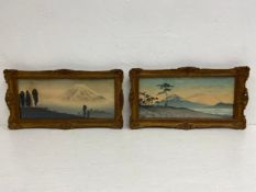 Two early 20th century Japanese woodblock prints, views of Mount Fuji, both signed and framed as a