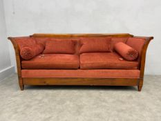 A mid 20th century beech framed Biedermeier style sofa having a scrolled, chenille upholstered