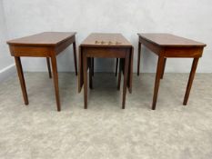 A large 19th century figured mahogany extending dining table in three parts comprised of two d-