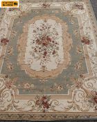 A large contemporary 'Classic Aubusson' carpet by Unique Loom. 305 x 395cm