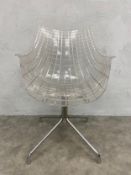 A vintage Italian transparent polycarbonate and chrome plated steel Meridiana chair with swivel