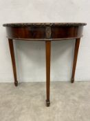 A late 19th century mahogany Jas. Shoolbred Georgian style console table with inset maker's