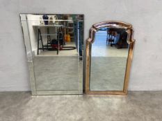 A vintage Pharmore wall mirror with bevelled frame and maker's label together with a shaped Art Deco