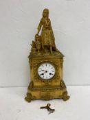 A 19th century French ormolu mantel clock with figural Arab girl cresting over the enamelled dial in