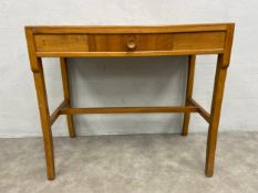 A mid century teak side table by Bartlett of High Wycombe. H.70 W.77 D.43cm.
