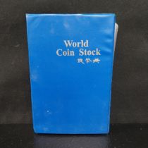 A large collection of sixty .900 and .999 silver world coins to include American Dollars, Chinese