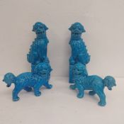 Two pairs of mid 20th century Persian blue or turquoise glazed Chinese porcelain figural foo dogs or