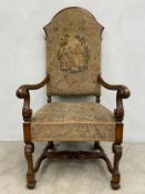 A 19th century walnut framed throne armchair in the Carolean style in tapestry upholstery. H.133 W.