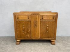 A small light oak mid-century sideboard in Art Deco style. H.94 W.122 D.50cm