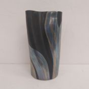 A contemporary black and metallic glazed studio pottery vase, hand signed and dated 1988 to the