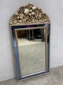 A contemporary Venetian style wall mirror having a silvered openwork cresting over the rectangular
