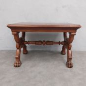 A late 19th century mahogany and satinwood inlaid low table on cross stretchered supports resting on