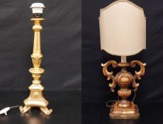 An early 20th century carved giltwood table lamp in the Rococo style having a shaped shade over