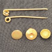 Two 9ct hallmarked gold brooch pins together with two hallmarked buttons and a 14ct yellow metal