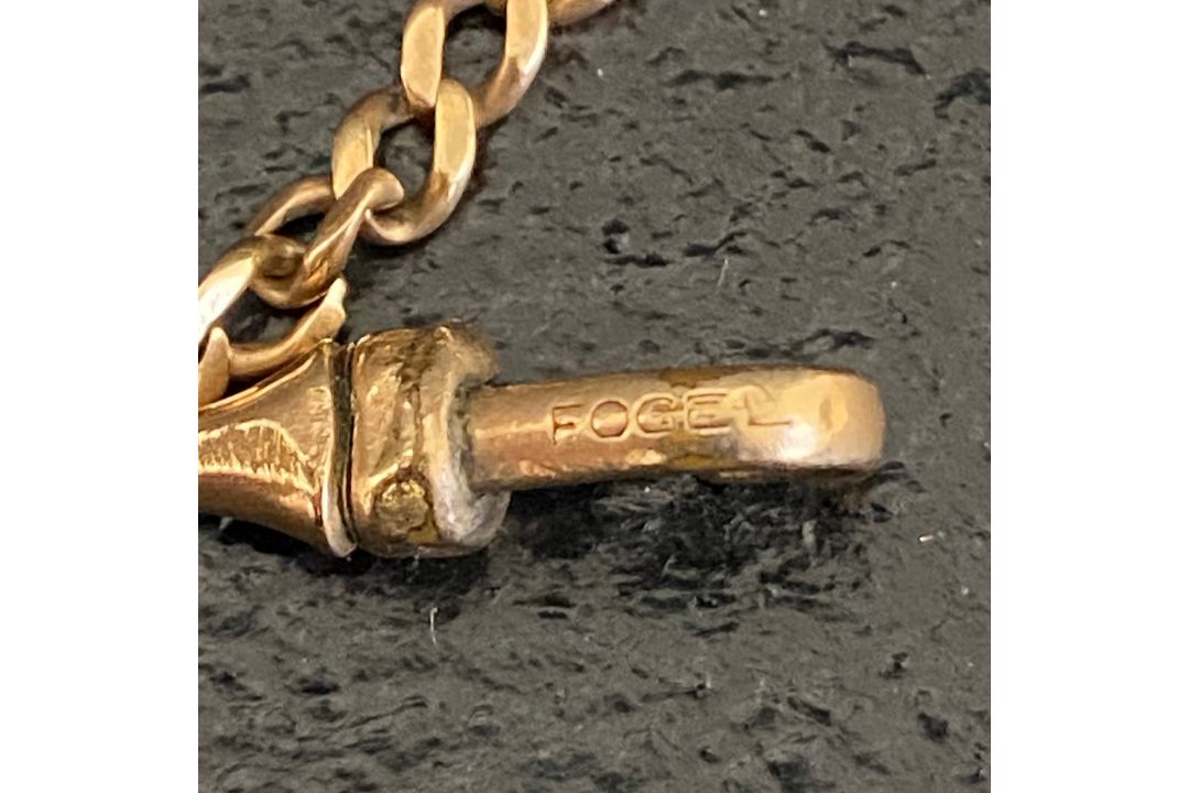 A 1920s 10ct yellow metal fob chain and pendant with impressed Fogel marks. Weight: 5.77g - Image 4 of 4