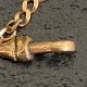 A 1920s 10ct yellow metal fob chain and pendant with impressed Fogel marks. Weight: 5.77g - Image 4 of 4
