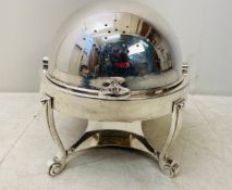A large 20th century silver plated chafing or roll-over serving dish of ovoid form raised on c-