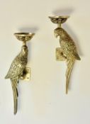 A pair of wall sconces in the form of perching parrots. 14x17x12cm.