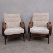 A pair of early to mid 20th century Art Deco style stained beech armchairs each having a square