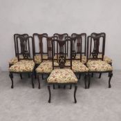 A set of ten late 19th century mahogany framed dining chairs in tapestry upholstery on cabriole