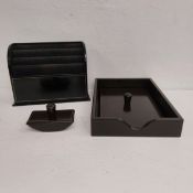 An Asprey of London desk set, a black leather stationery box with a blotter, paper tray with lid