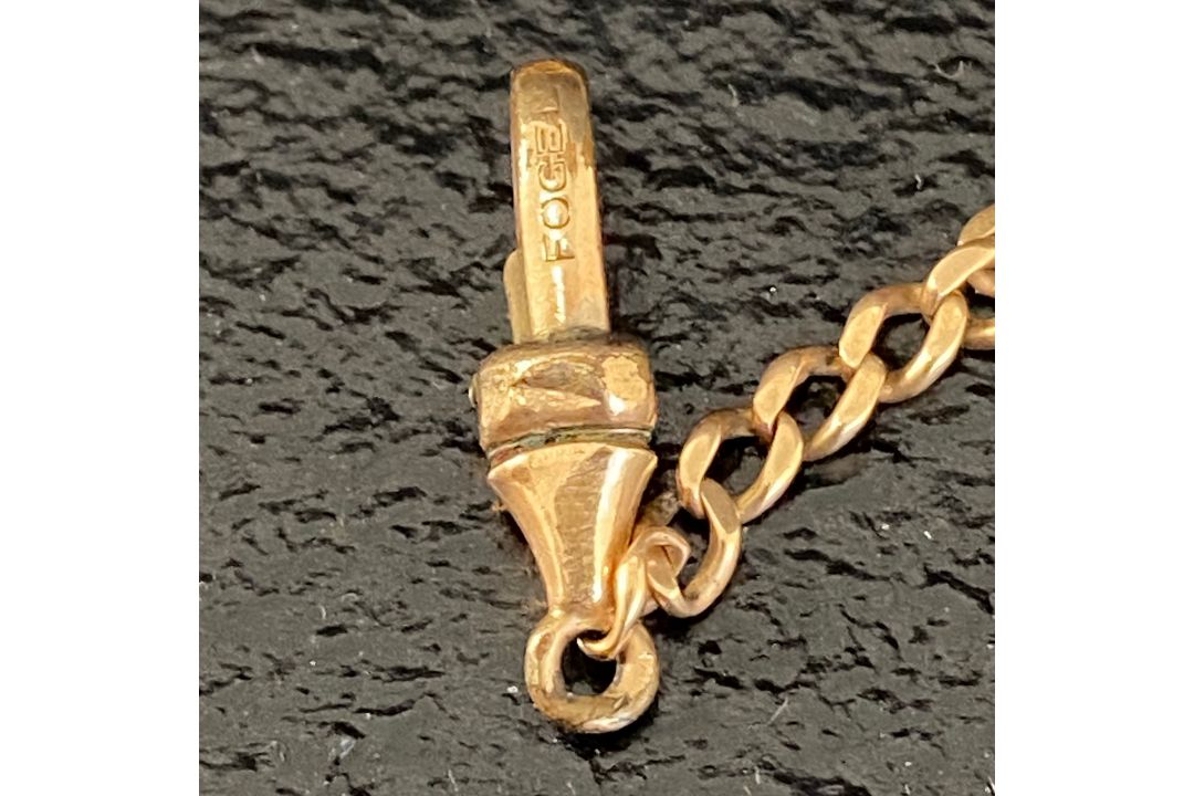A 1920s 10ct yellow metal fob chain and pendant with impressed Fogel marks. Weight: 5.77g - Image 3 of 4