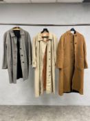 Three vintage ladies' wool and alpaca Aquascutum coats. H.125cm. (Largest)