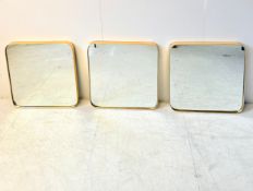 A set of three contemporary wall mirrors in gilt metal frames. 41x41cm.