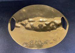 A contemporary brass studio style centrepiece tray of free form with an etched signature. L.47 H.