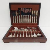 A vintage sterling silver cutlery canteen service for six place settings in a fitted box by James