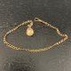 A 1920s 10ct yellow metal fob chain and pendant with impressed Fogel marks. Weight: 5.77g - Image 1 of 4