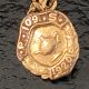 A 1920s 10ct yellow metal fob chain and pendant with impressed Fogel marks. Weight: 5.77g - Image 2 of 4