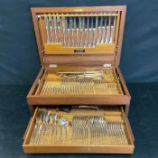 A vintage Danish sterling silver cutlery canteen service for eight place settings in a fitted teak