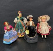 A collection of four 1950/60s vintage dolls in national dress. Tallest 26cm.
