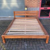 A contemporary king size teak bed frame. H.35 W.168 L.213cm. (Headboard H.80cm.) Mattress