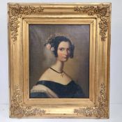A 19th century Austrian school oil on canvas, portrait of a lady, in a gilt frame. H.43.5 W.38cm
