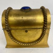 A 19th century gilt bronze jewellery or perfume box with hinged ark top draped with a faux rope