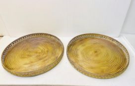 A pair of contemporary painted metal trays with openwork gallery surrounds. Dia 61cm.