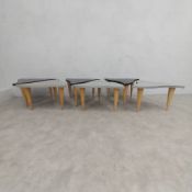 A set of six vintage side tables with wavy triangular tops, fitting together to form a single