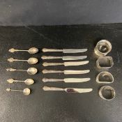 A mixed lot of hallmarked silver to include four napkin rings, five Edwardian and other