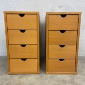 A pair of contemporary light oak bedside or filing cabinets. H.55 W.29 D.45cm.