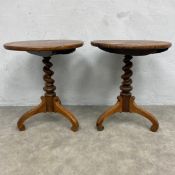 A pair of 19th century mahogany wine or lamp occasional tables each with circular top over the