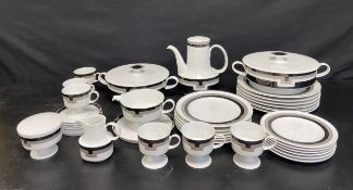 A Rosenthal dinner service comprising six dinner, dessert and tea plates, six cups and saucers,